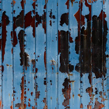 Grunge blue metal background with peeling paint. Abstract background