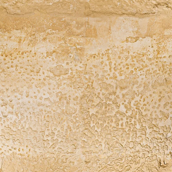 close up of old painted stone wall