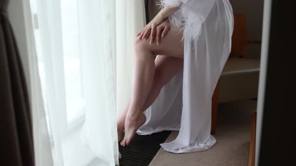 Legs Woman White Bathrobe Pajamas Morning Hotel Room — Stock Video