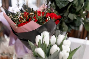 a white and red tulips for a birthday bouquet