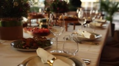 food and drinks on a table in a restaurant at a wedding, birthday, anniversary