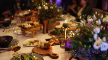 food and drinks on a festive table in a restaurant at a wedding, birthday, anniversary