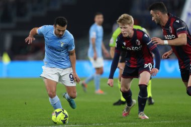 Rome, Italy 19.01.2023: Pedro (Lazio), Jerdy Schouten (Bol) in action during  the Freccia Rossa Italy Cup match between SS Lazio and Bologna  at Stadio Olimpico on January 19, 2023 in Rome, Italy.
