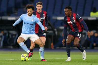 Rome, Italy 19.01.2023: Felipe Anderson (Lazio),  Lucumi (Bologna) in action during  the Freccia Rossa Italy Cup match between SS Lazio and Bologna  at Stadio Olimpico on January 19, 2023 in Rome, Italy.