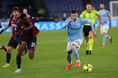 Rome, Italy 19.01.2023: Lucume (Bologna) Mattia Zaccagni (Lazio) in action during  the Freccia Rossa Italy Cup match between SS Lazio and Bologna  at Stadio Olimpico on January 19, 2023 in Rome, Italy.