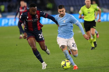 Rome, Italy 19.01.2023: Lucume (Bologna) Mattia Zaccagni (Lazio) in action during  the Freccia Rossa Italy Cup match between SS Lazio and Bologna  at Stadio Olimpico on January 19, 2023 in Rome, Italy.