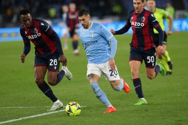 Rome, Italy 19.01.2023: Lucume (Bologna) Mattia Zaccagni (Lazio) in action during  the Freccia Rossa Italy Cup match between SS Lazio and Bologna  at Stadio Olimpico on January 19, 2023 in Rome, Italy.