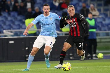 Rome, Italy 24.01.2023: Adam Marusic (Lazio) in tackle on Sergio Dest (Milan) during the Serie A match day 19 between SS Lazio and AC Milan at Stadio Olimpico on January 24, 2023 in Rome, Italy.