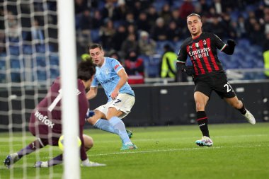 Rome, Italy 24.01.2023: Adam Marusic (Lazio) in tackle on Sergio Dest (Milan) during the Serie A match day 19 between SS Lazio and AC Milan at Stadio Olimpico on January 24, 2023 in Rome, Italy.