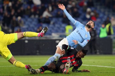 Rome, Italy 24.01.2023: Elseid Hysaj (Lazio) in tackle on Rafael Leao (Milan) during the Serie A match day 19 between SS Lazio and AC Milan at Stadio Olimpico on January 24, 2023 in Rome, Italy.