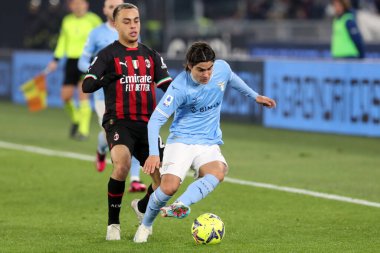 Rome, Italy 24.01.2023: Sergio Dest (Milan), Luka Romero (Lazio)  in action during the Serie A match day 19 between SS Lazio and AC Milan at Stadio Olimpico on January 24, 2023 in Rome, Italy.