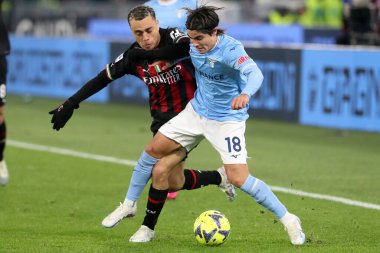 Rome, Italy 24.01.2023: Sergio Dest (Milan), Luka Romero (Lazio)  in action during the Serie A match day 19 between SS Lazio and AC Milan at Stadio Olimpico on January 24, 2023 in Rome, Italy.
