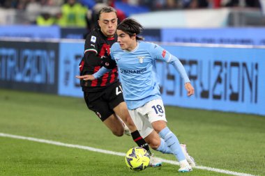 Rome, Italy 24.01.2023: Sergio Dest (Milan), Luka Romero (Lazio)  in action during the Serie A match day 19 between SS Lazio and AC Milan at Stadio Olimpico on January 24, 2023 in Rome, Italy.
