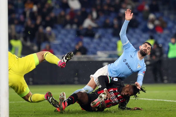 Rome, Italy 24.01.2023: Elseid Hysaj (Lazio) in tackle on Rafael Leao (Milan) during the Serie A match day 19 between SS Lazio and AC Milan at Stadio Olimpico on January 24, 2023 in Rome, Italy.