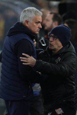 Rome, Italy 01.02.2023: Jose Mourinho coach manager (AS ROMA) greet Ballardini coach manager (CREMONESE) in  the semifinal Italy Cup match between AS Roma and Cremonese at OLYMPIC STADIUM on February 01, 2023 in Rome, Italy.