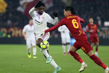 Rome, Italy 01.02.2023: Frank Tsadjout (CREMONESE), Chris Smalling (AS ROMA) in action during the semifinal Italy Cup match between AS Roma and Cremonese at OLYMPIC STADIUM on February 01, 2023 in Rome, Italy.