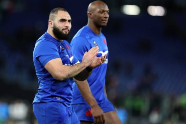 Rome, Italy 05.02.2023:  JULIEN MARCHAND (FRA), SEKOU MACALOU (FRA) greet fans at end of  the Guinness Six Nations 2023 rugby match between ITALY vs France at Stadio Olimpico on February 05, 2023 in Rome, Italy.
