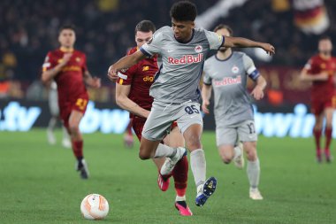 Rome, Italy 19.02.2023:  Andrea Belotti of Roma, BERNARDO (SALZBURG) in action during the  UEFA EUROPA League 2023 football match between AS Roma vs FC Salzburg at Stadio Olimpico on February 23, 2023 in Rome, Italy.