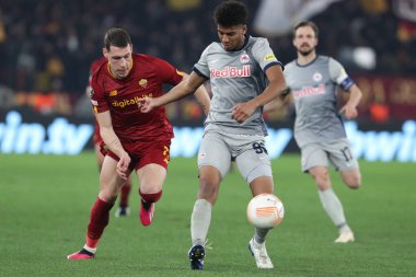 Rome, Italy 19.02.2023:  Andrea Belotti of Roma, BERNARDO (SALZBURG) in action during the  UEFA EUROPA League 2023 football match between AS Roma vs FC Salzburg at Stadio Olimpico on February 23, 2023 in Rome, Italy.