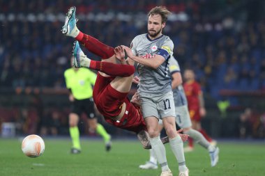 Rome, Italy 19.02.2023: Roger Ibanez of Roma, ANDREAS ULMER (SALZBURG) in action during the  UEFA EUROPA League 2023 football match between AS Roma vs FC Salzburg at Stadio Olimpico on February 23, 2023 in Rome, Italy.
