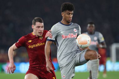 Rome, Italy 19.02.2023: Andrea Belotti of Roma, BERNARDO (SALZBURG) in action during the  UEFA EUROPA League 2023 football match between AS Roma vs FC Salzburg at Stadio Olimpico on February 23, 2023 in Rome, Italy.