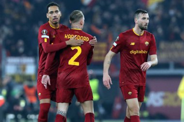 Rome, Italy 19.02.2023: Chris Smalling of Roma, Rick Karsdorp of Roma celebrate victory at end of  the  UEFA EUROPA League 2023 football match between AS Roma vs FC Salzburg at Stadio Olimpico on February 23, 2023 in Rome, Italy.