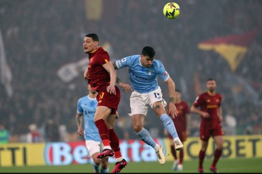 Roma, İtalya 19.03.2023: Andrea Belottii, Alessio Romagnoli (Lazio) Serie A Şampiyonası sırasında, SS Lazio ile AS Roma arasındaki futbol maçı Roma, İtalya 'daki Stadio Olimpico' da.