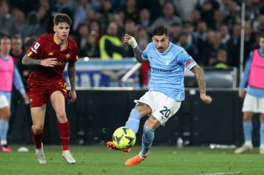 Roma, İtalya 19.03.2023: Mattia Zaccagni (Lazio) golü attı (1-0) ve Serie A Şampiyonası 'nda takımla birlikte, İtalya' nın başkenti Roma 'daki Stadio Olimpico' da SS Lazio 'nun AS Roma' ya karşı oynadığı futbol müsabakası maçını kutladı..