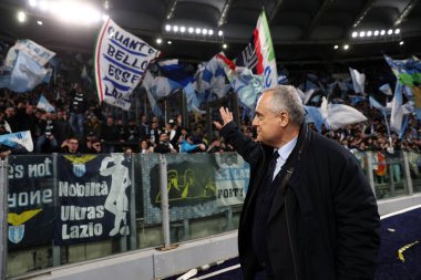 Rome, Italy 19.03.2023: President Lazio Claudio Lotito celebrate victory in derby for 1-0 at end of the match Serie A Championship, football match derby between SS Lazio vs AS Roma at Stadio Olimpico in Rome, Italy. clipart