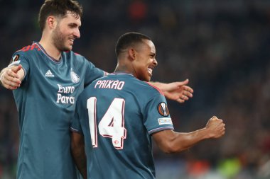 Rome, Italy 20.04.2023: Igor Paixao of Feyenoord score the goal and celebrate with the team in the Uefa Europa League 2023 football match, quarter finals, AS Roma vs Feyenoord  at Olympic stadium in Rome, Italy. clipart