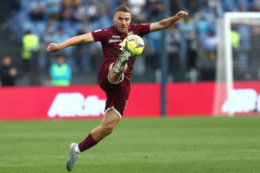 Roma, İtalya 22.04.2023: Torino 'lu Vlasic Nikola, İtalya' nın başkenti Roma 'daki Olimpiyat Stadyumu' nda SS LAZIO ile FC TORINO arasında oynanan Serie A 2022 / 2023 futbol karşılaşmasında eylem halindedir..