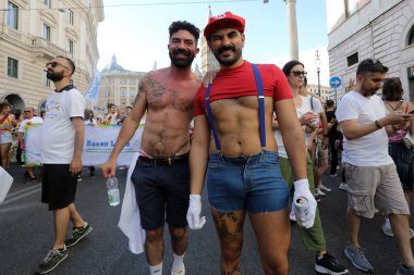 Rome, Italy 10.06.2023:  More than one hundred thousand people from all over Europe paraded at the 2023 Rome Gaypride through the streets of the capital Rome up to the Colosseum. clipart