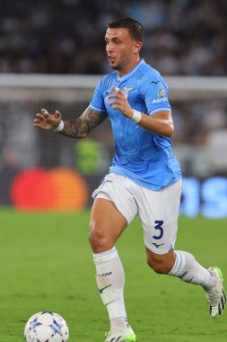 Roma, İtalya 19.09.2023: Lazio 'lu Luca Pellegrini, Uefa Şampiyonlar Ligi 2023-2024, E grubu, SS Lazio ile Atletico de Madrid arasında Roma Olimpiyat Stadyumu' nda oynanan karşılaşma sırasında eylem halindeydi..