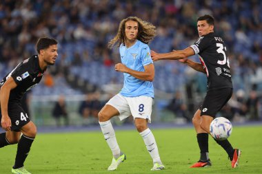 Roma, İtalya 23.09.2023: Lazio 'dan Matteo Guendouzi, Monza' dan Matteo Pessina İtalya Serie A TIM 2023-2024 5 günlük futbol karşılaşması sırasında Roma 'daki Olimpiyat Stadyumu' nda SS Lazio 'ya karşı AC Monza.