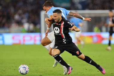 Roma, İtalya 23.09.2023: Monza 'dan Patrick Ciurria, Lazio' dan Luca Pellegrini İtalya Serisi A TIM 2023-2024 5 futbol karşılaşması sırasında Roma Olimpiyat Stadyumu 'nda SS Lazio' ya karşı AC Monza.