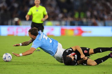 Roma, İtalya 23.09.2023: Monza 'dan Patrick Ciurria, Lazio' dan Luca Pellegrini İtalya Serisi A TIM 2023-2024 5 futbol karşılaşması sırasında Roma Olimpiyat Stadyumu 'nda SS Lazio' ya karşı AC Monza.