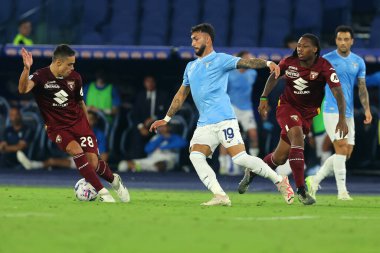 Roma, İtalya 27.09.2023: Torino 'lu Ricci, Lazio' lu Taty Castellanos İtalya Serisi A TIM 2023-2024 6 günlük futbol karşılaşması sırasında Roma Olimpiyat Stadyumu 'nda SS Lazio FC Torino' ya karşı.