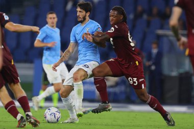 Roma, İtalya 27.09.2023: Lazio 'dan Luis Alberto. Torino 'lu Soppy İtalya Serisi A TIM 2023-2024 6 gün süren futbol karşılaşmasında SS Lazio ile FC Torino arasında Roma Olimpiyat Stadyumu' nda karşılaşacak..