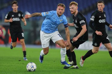 Roma, İtalya 28.11.2023: Lazio 'dan Ciro Immobile, Uefa Şampiyonlar Ligi 2023-2024, E grubu, Roma' daki Olimpiyat Stadyumu 'nda SS Lazio' ya karşı Celtic Glasgow arasındaki maçta Celtic Glasgow.