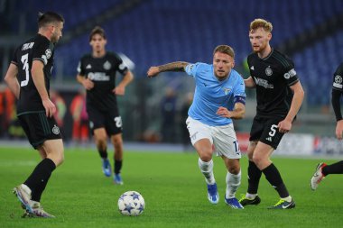 Roma, İtalya 28.11.2023: Lazio 'dan Ciro Immobile, Uefa Şampiyonlar Ligi 2023-2024, E grubu, Roma' daki Olimpiyat Stadyumu 'nda SS Lazio' ya karşı Celtic Glasgow arasındaki maçta Celtic Glasgow.