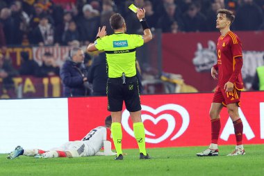 Rome, Italy 03.01.2024: Referee Pialletto extract yellow card for Diego Llorente of Roma during  the ITALY TIM CUP 2023-2024, round of 16,  football match AS ROMA VS CREMONESE at Olympic Stadium in Rome.