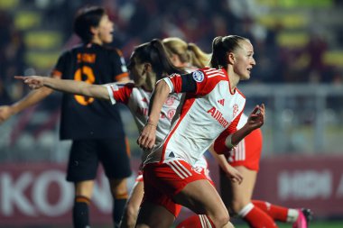 Rome, Italy 24.01.2024: Lea Schuller of Bayern score the goal 2-2 and celebrate with the team in the UEFA Women's Champions League 2023-2024 football match, group stage C, between AS Roma vs FC Bayern Munchen at Tre fontane stadium in Rome. clipart