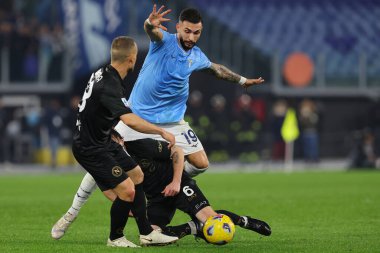 Roma, İtalya 28.01.2024: Lazio 'lu Taty Castellanos İtalya Serisi A TIM 2023-2024 futbol karşılaşmasında Napoli' li Mario Rui ile birlikte Roma 'daki Olimpiyat Stadyumu' nda SSC Napoli 'ye karşı mücadele etti..