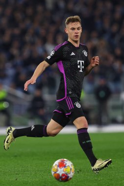 Roma, İtalya 14.2.2024: Bayern Münih 'ten Joshua Kimmich Uefa Şampiyonlar Ligi 2023-2024 karşılaşmasında 16 futbol karşılaşması SS Lazio' ya karşı FC Bayern Mucnhen Roma Olimpiyat Stadyumu 'nda.