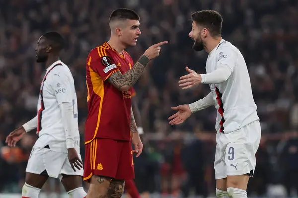 stock image Rome, Italy 18.04.2024: Gianluca Mancini of Roma, Olivier Giroud of Milan during the UEFA Europa League 2023-2024, quarter final , football match between AS Roma vs AC Milan at Olympic Stadium in Rome.