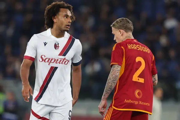 stock image Rome, Italy 22.04.2024: Joshua Zirkzee of Bologna Diego Llorente of Roma during Italian Serie A TIM 2023-2024 football match derby AS ROMA vs BOLOGNA FC 1909 at Olympic Stadium in Rome.