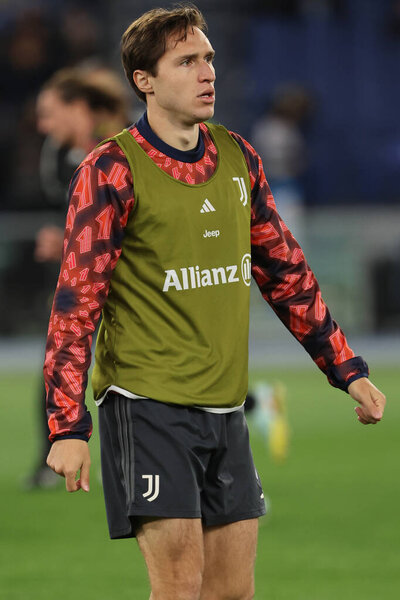 Rome, Italy 23.04.2024:  Federico Chiesa of Juventus during warm up in Italy Cup - Coppa Italia Frecciarossa 2023-2024 semi-finals football match derby SS LAZIO  vs JUVENTUS FC 1909 at Olympic Stadium in Rome.