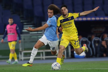 Roma, İtalya 27.04.2024: Lazio 'dan Matteo Guendouzi, Serie A Tim 2023-2024 futbol karşılaşmasında Verona' dan Serdar, Roma 'daki Olimpiyat Stadyumu' nda SS LAZIO-HELLAS VERONA.