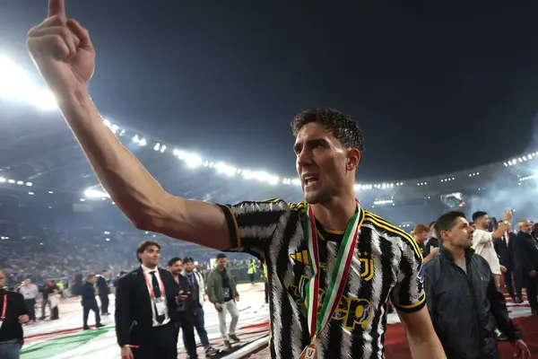 stock image Rome, Italy 15.05.2024:  Dusan Vlahovic of Juventus with cup celebrate victory at end of the ITALY CUP 2023-2024, Coppa Italia Frecciarossa, football match Atalanta Bergamasca vs FC Juventus at Olympic Stadium in Rome.