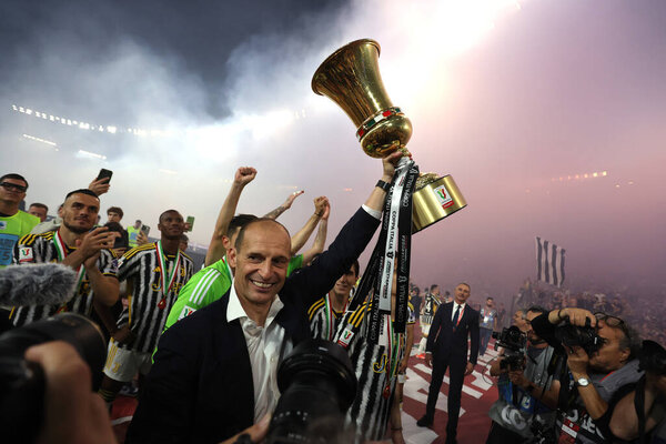 Rome, Italy 15.05.2024:  Massimiliano Allegri coach of Juventus with cup celebrate victory at end of the ITALY CUP 2023-2024, Coppa Italia Frecciarossa, football match Atalanta Bergamasca vs FC Juventus at Olympic Stadium in Rome.